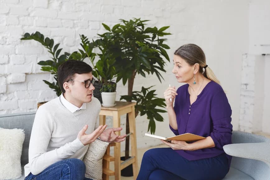 Clinician reviewing a session with a client